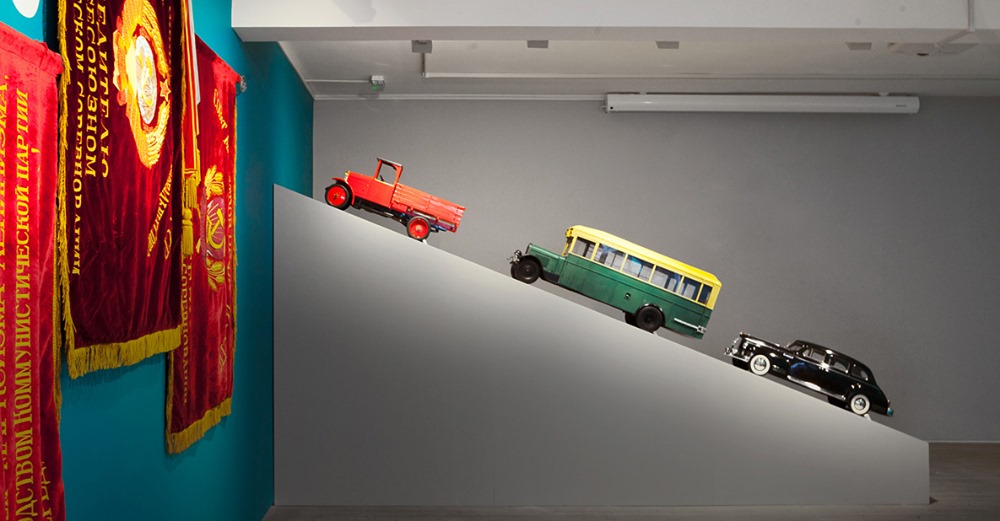 Toy truck, bus and car from Work and Play Behind the Iron Curtain at GRAD Gallery